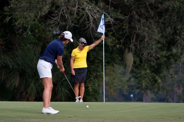 Women Golfing Outside