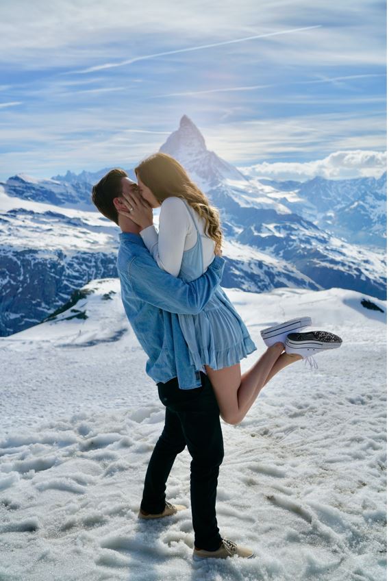 couple engaged in snow